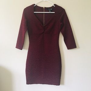 Burgundy slimming dress.